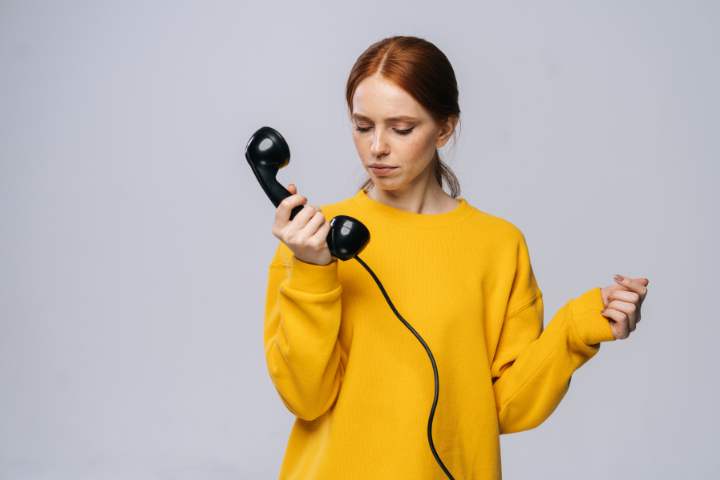 Women Holding Phone